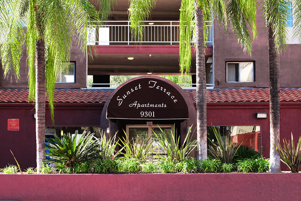 This image displays entrance marker photo of Sunset Terrace Apartments