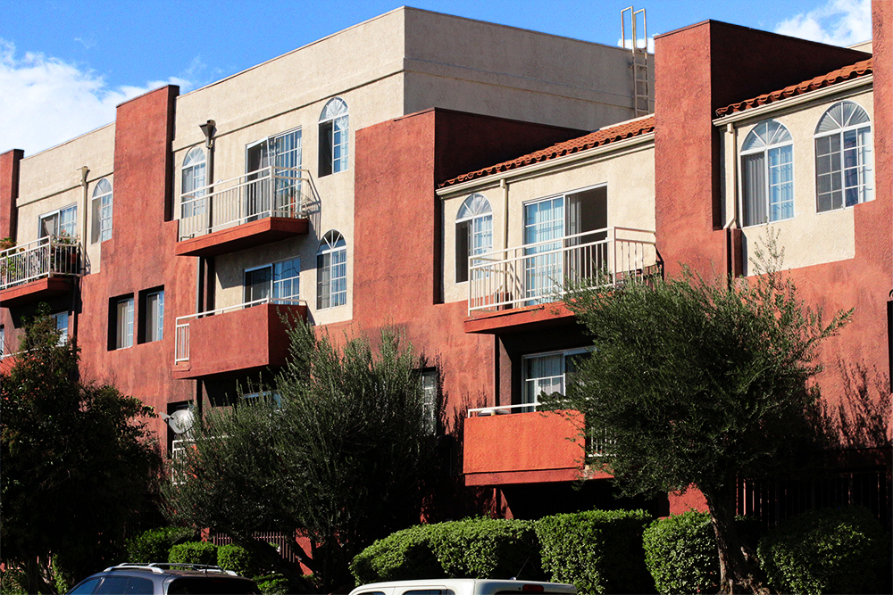 This image displays exterior photo of Sunset Terrace Apartments