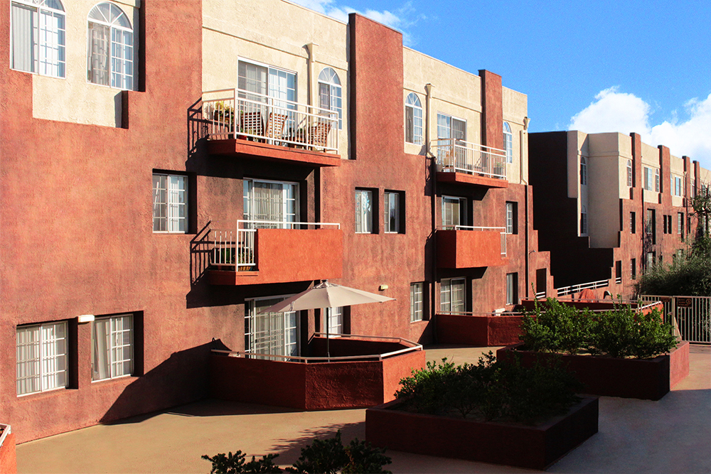 This image displays swimming pool photo of Sunset Terrace Apartments